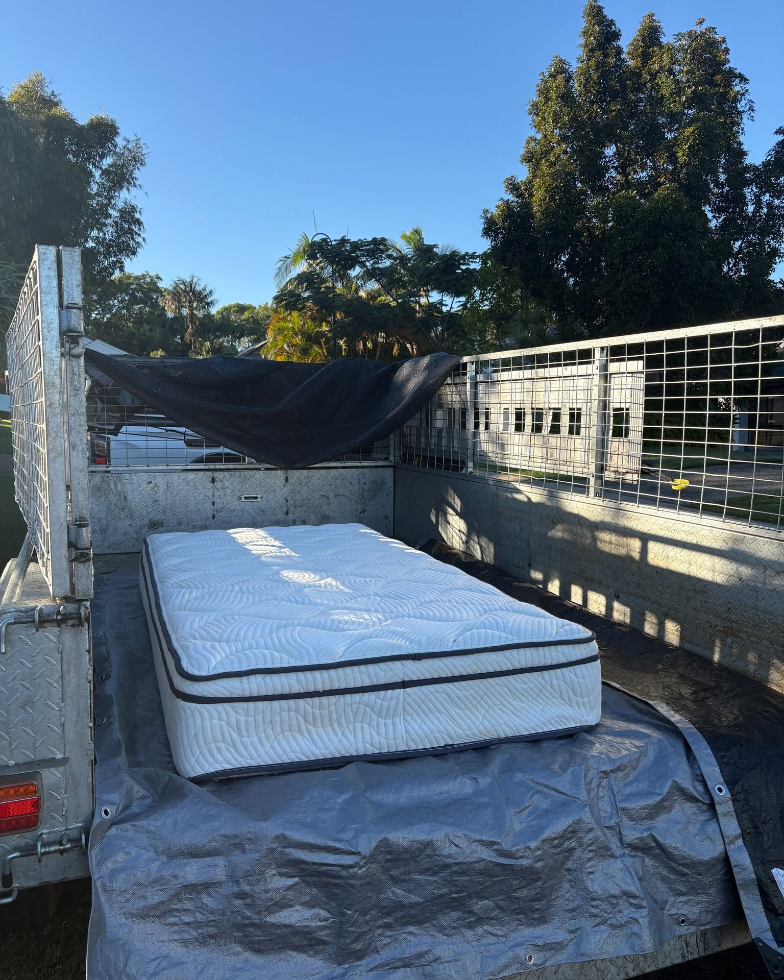 Mattress Removal & Recycling across the Northern Rivers 2 White mattress ready for collection in the trailer