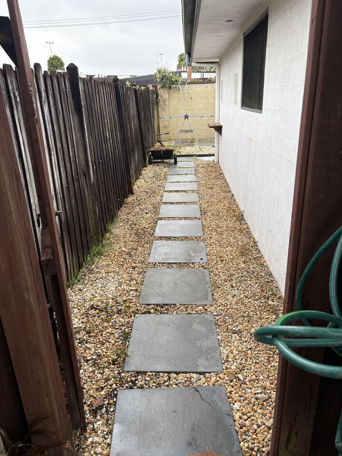 Construction Waste Removal in Byron Bay & Bangalow 3 The same side path cleared by 427 Shift, back to bare gravel and pavers